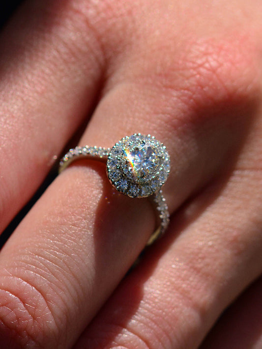 An Oval cut Halo set diamond ring