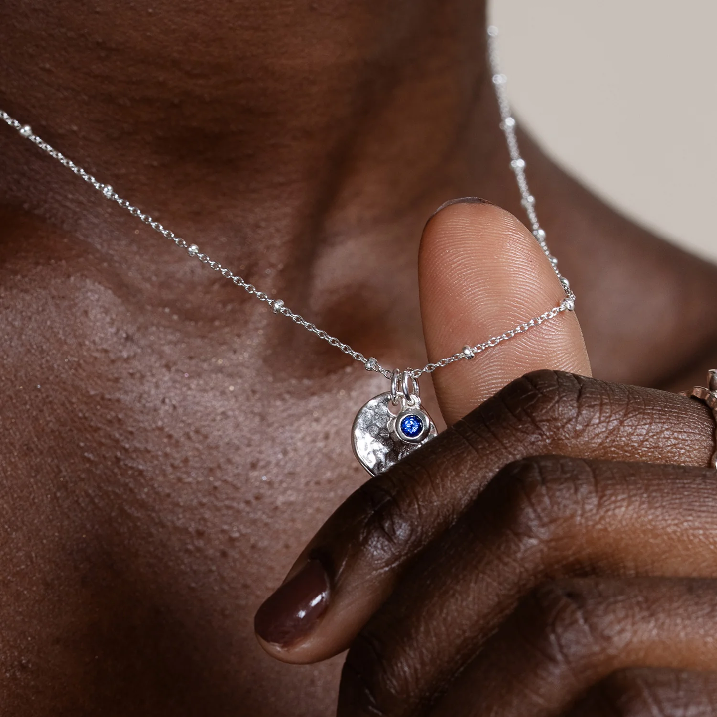 DOWER & HALL Hammered Disc & Blue Sapphire Array Necklace