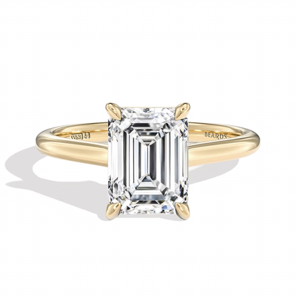 Classic Four Claw Emerald Cut Yellow Gold
