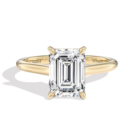 Classic Four Claw Emerald Cut Yellow Gold