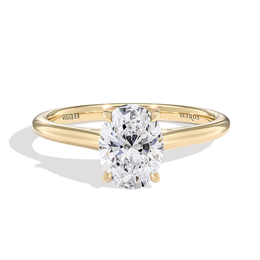 Classic Four Claw Oval Cut Yellow Gold